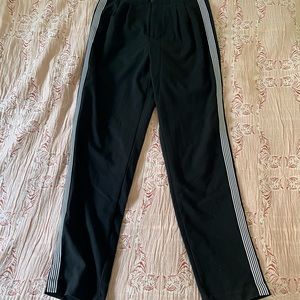 Adorable black fitted pants. Cute striped detail on the side. Perfect for work.